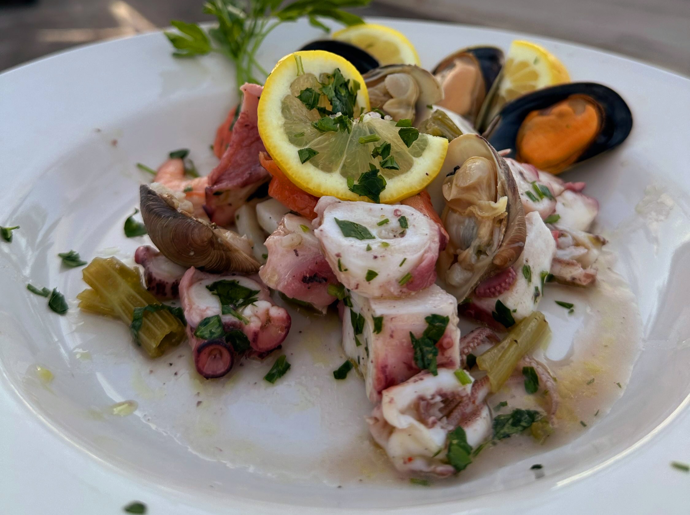 Cold seafood salad with octopus, mussels and clams